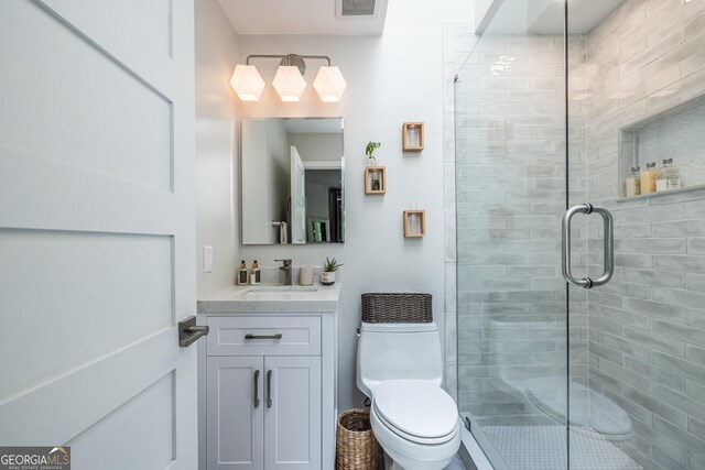 1192 Cleburne Ave NE, Atlanta, GA 30307 - bathroom featuring vanity and a stall shower