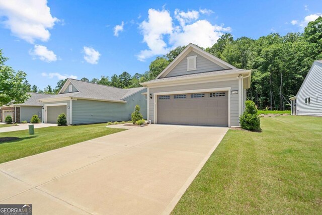 1290 Starboard Way, Greensboro, GA 30642 - view of front of home featuring a front lawn and concrete driveway