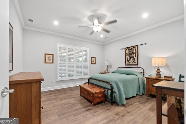 1290 Starboard Way, Greensboro, GA 30642 - bedroom featuring light wood-style flooring, ornamental molding, recessed lighting, and ceiling fan