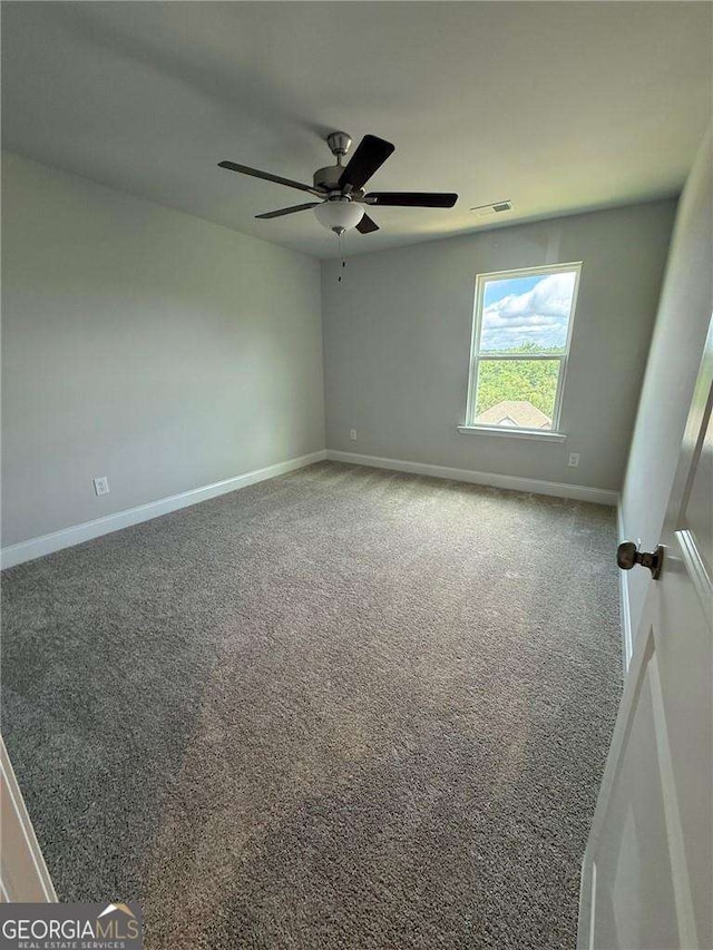 4266 Azalea Ridge Way, Hoschton, GA 30548 - carpeted empty room featuring a ceiling fan and baseboards