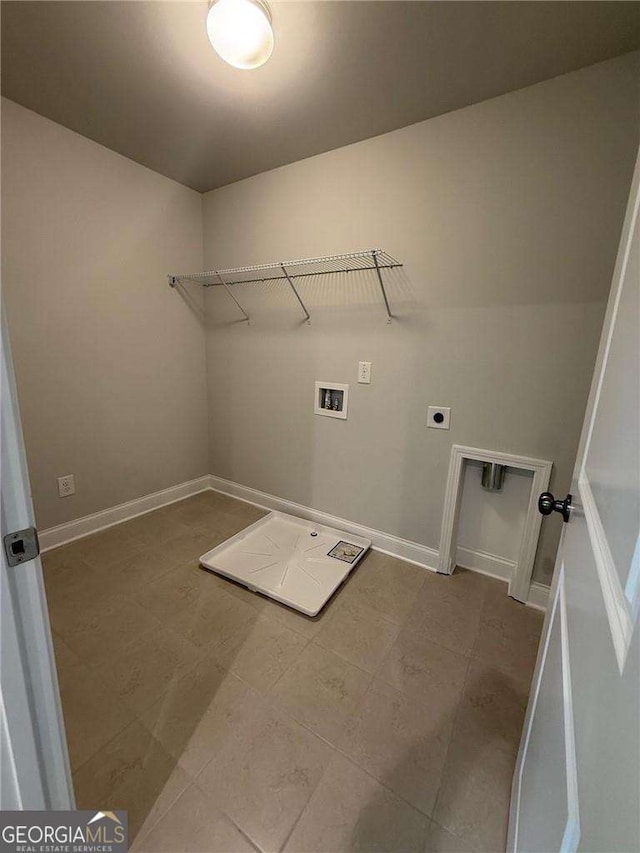 4266 Azalea Ridge Way, Hoschton, GA 30548 - laundry area featuring hookup for a washing machine, hookup for an electric dryer, and tile patterned floors