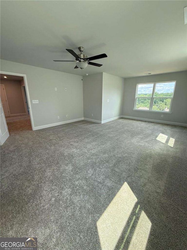 4266 Azalea Ridge Way, Hoschton, GA 30548 - carpeted empty room with baseboards and a ceiling fan