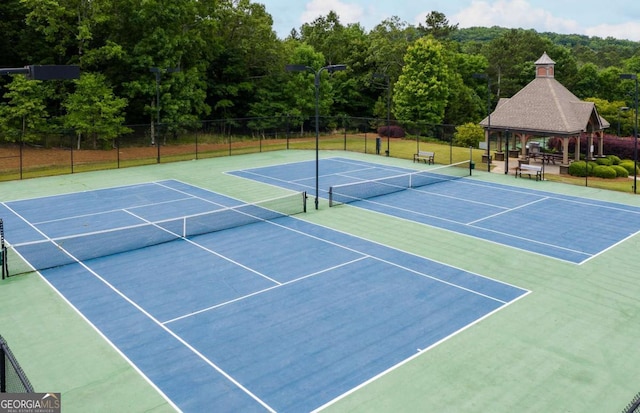 4266 Azalea Ridge Way, Hoschton, GA 30548 - view of tennis court featuring a gazebo, a view of trees, and community basketball court