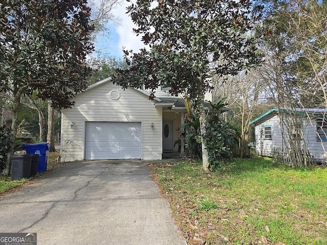 362 Cape Ave, Saint Augustine, FL 32084 - ranch-style home with a garage and asphalt driveway