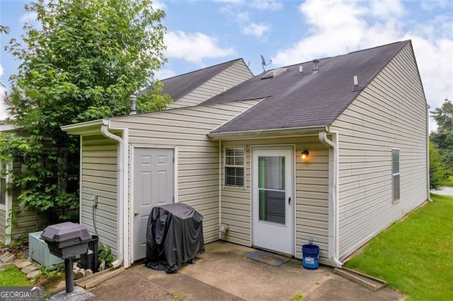 6178 Field Stone, Douglasville, GA 30134 - back of house with a patio and roof with shingles