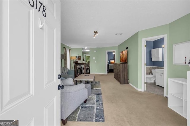 6178 Field Stone, Douglasville, GA 30134 - living room featuring carpet flooring and baseboards
