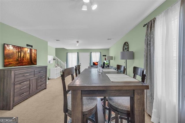 6178 Field Stone, Douglasville, GA 30134 - dining space with light carpet and stairway