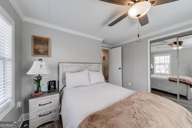 281 Jones Rd, Jefferson, GA 30549 - bedroom featuring crown molding, a ceiling fan, a closet, and wood finished floors