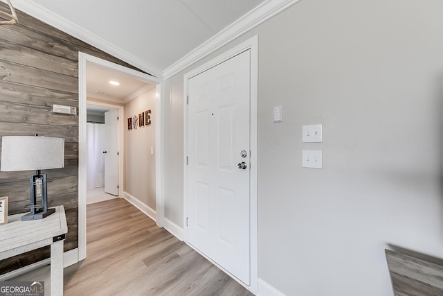 281 Jones Rd, Jefferson, GA 30549 - foyer with crown molding, light wood-type flooring, lofted ceiling, and wooden walls