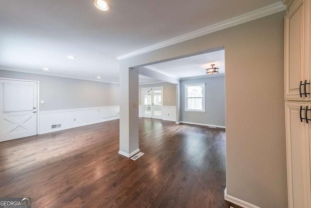 9805 Buice Rd, Alpharetta, GA 30022 - unfurnished living room with ornamental molding, dark wood-type flooring, and recessed lighting