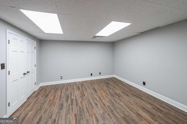 9805 Buice Rd, Alpharetta, GA 30022 - spare room featuring wood finished floors and a drop ceiling