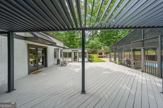 9805 Buice Rd, Alpharetta, GA 30022 - wooden terrace with a sunroom
