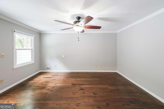 9805 Buice Rd, Alpharetta, GA 30022 - spare room featuring ornamental molding, a ceiling fan, and wood finished floors