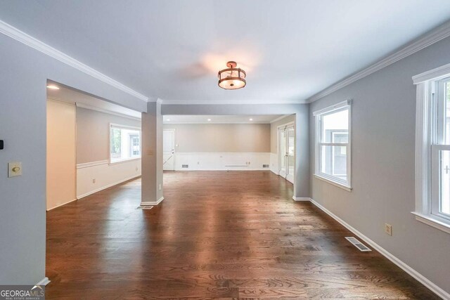 9805 Buice Rd, Alpharetta, GA 30022 - spare room featuring dark wood-type flooring, decorative columns, and ornamental molding