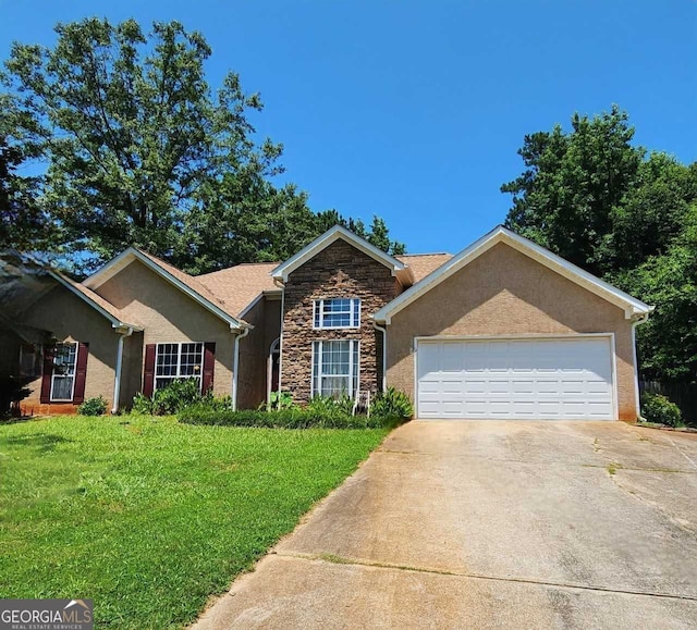 625 Chaseridge Dr, Mcdonough, GA 30253 - view of front of home featuring stone siding, driveway, stucco siding, a front lawn, and an attached garage