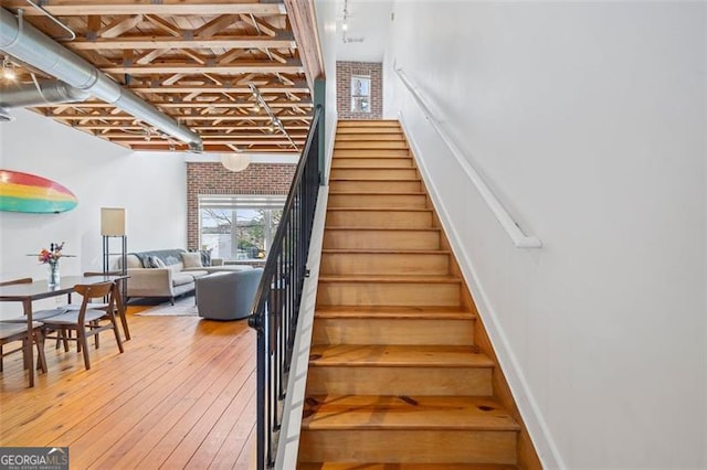 322 Peters Unit 2, Atlanta, GA 30313 - stairway with hardwood / wood-style floors and baseboards