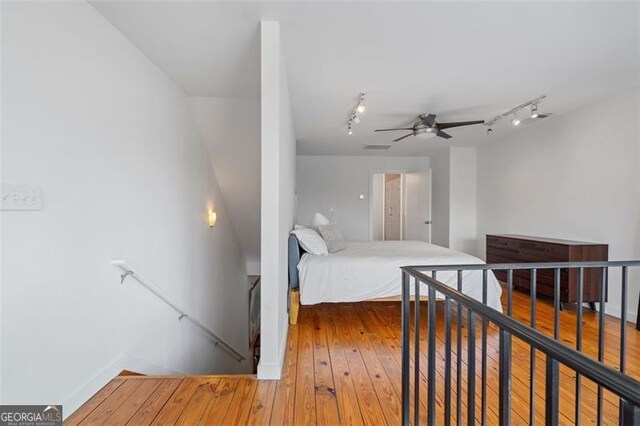 322 Peters Unit 2, Atlanta, GA 30313 - bedroom featuring track lighting, hardwood / wood-style floors, and a ceiling fan