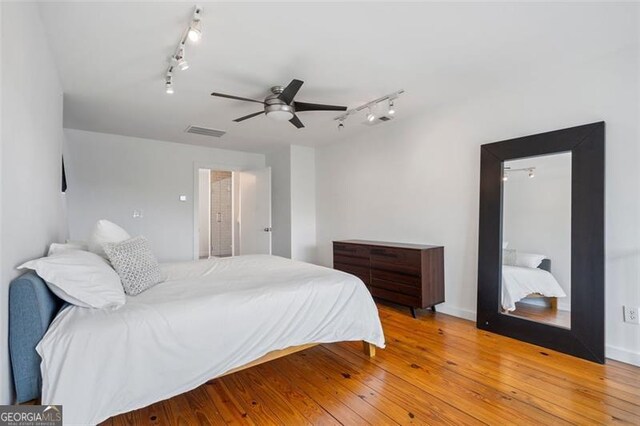 322 Peters Unit 2, Atlanta, GA 30313 - bedroom with track lighting, light wood-type flooring, and ceiling fan