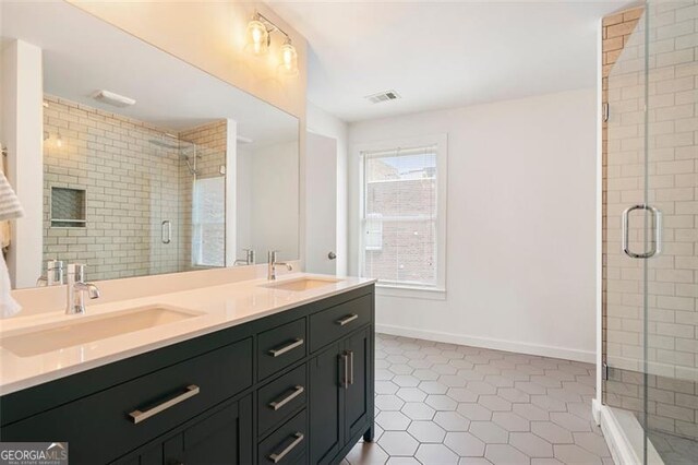 322 Peters Unit 2, Atlanta, GA 30313 - full bath with a shower stall, double vanity, and tile patterned flooring