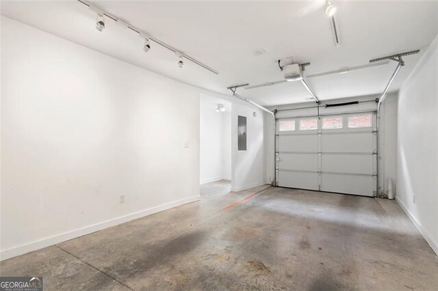 322 Peters Unit 2, Atlanta, GA 30313 - garage with a garage door opener and electric panel