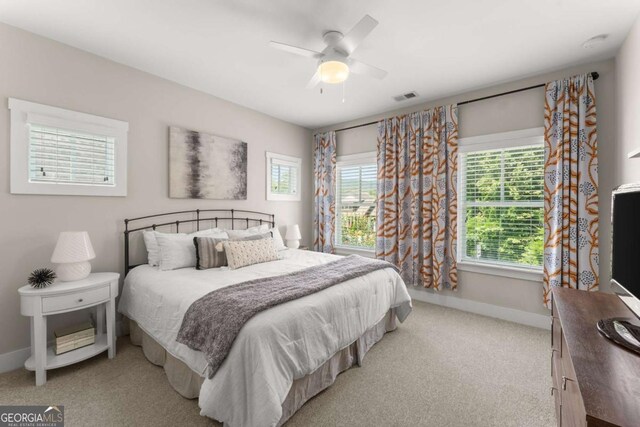 109 Bellehaven Dr, Woodstock, GA 30188 - carpeted bedroom with baseboards and a ceiling fan