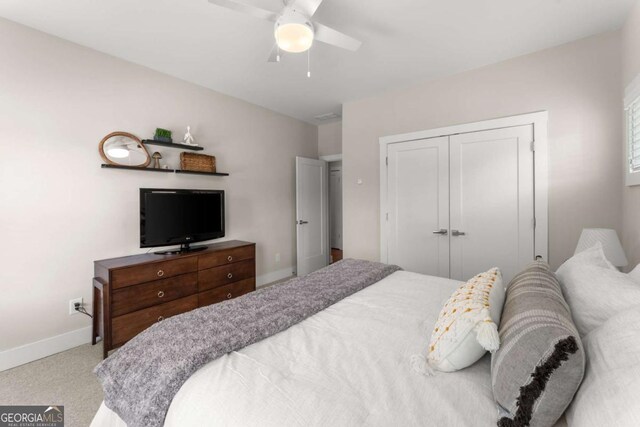 109 Bellehaven Dr, Woodstock, GA 30188 - carpeted bedroom with a closet and ceiling fan