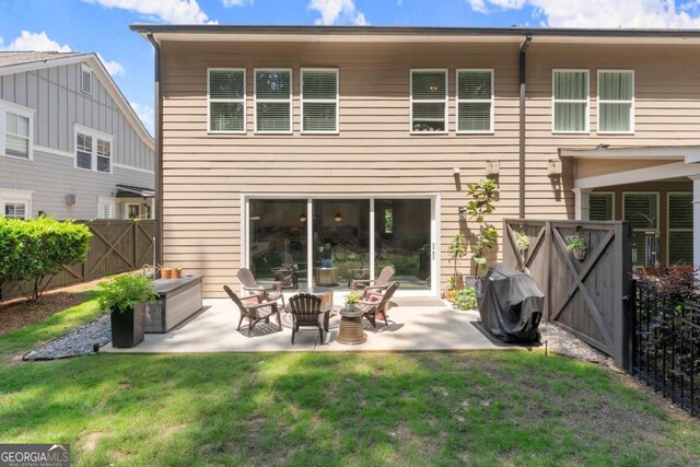 109 Bellehaven Dr, Woodstock, GA 30188 - rear view of house with a gate, a fenced backyard, and a patio area