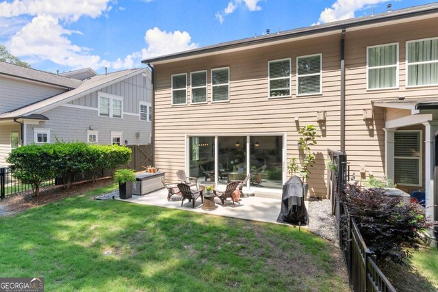 109 Bellehaven Dr, Woodstock, GA 30188 - back of property featuring a fenced backyard and a patio area