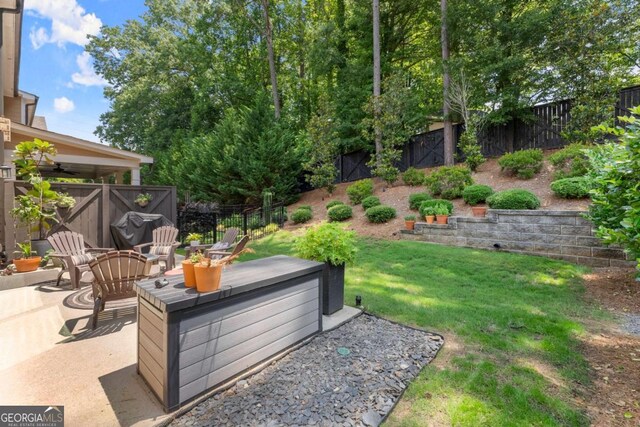 109 Bellehaven Dr, Woodstock, GA 30188 - fenced backyard featuring a ceiling fan and a patio