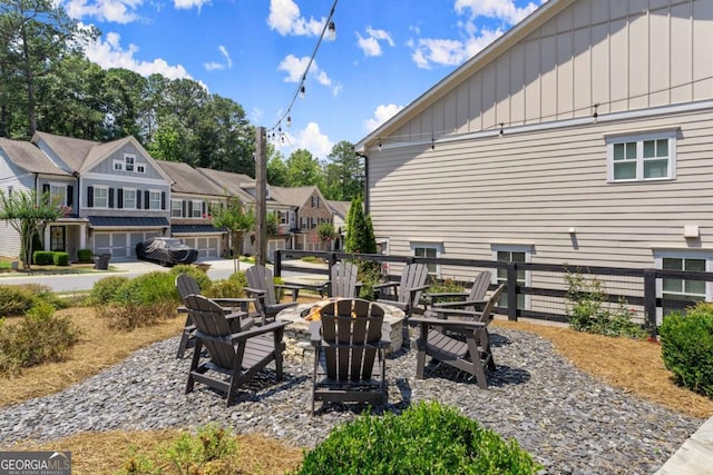 109 Bellehaven Dr, Woodstock, GA 30188 - view of patio featuring a fire pit and a residential view
