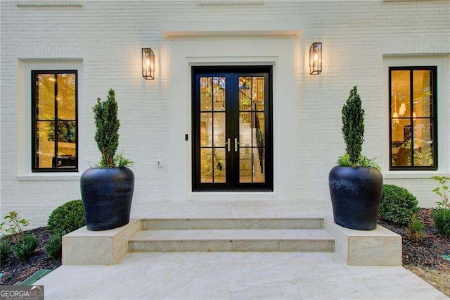 6090 River Chase Cir, Atlanta, GA 30328 - doorway to property featuring french doors and brick siding
