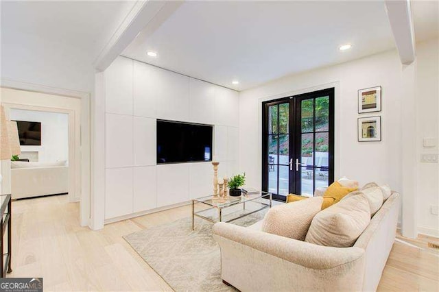 6090 River Chase Cir, Atlanta, GA 30328 - living area with french doors, light wood finished floors, recessed lighting, and beamed ceiling