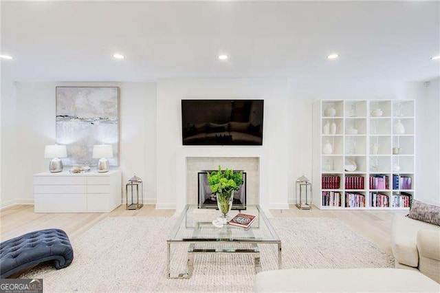 6090 River Chase Cir, Atlanta, GA 30328 - living room featuring recessed lighting, a fireplace, and wood finished floors