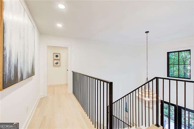 6090 River Chase Cir, Atlanta, GA 30328 - corridor featuring recessed lighting, wood finished floors, and an upstairs landing