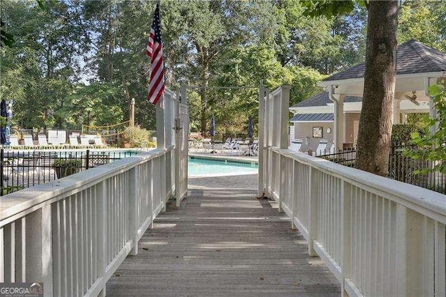 6090 River Chase Cir, Atlanta, GA 30328 - deck with a community pool and view of scattered trees
