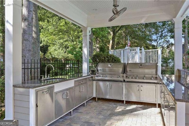 6090 River Chase Cir, Atlanta, GA 30328 - view of patio featuring an outdoor kitchen and a sink
