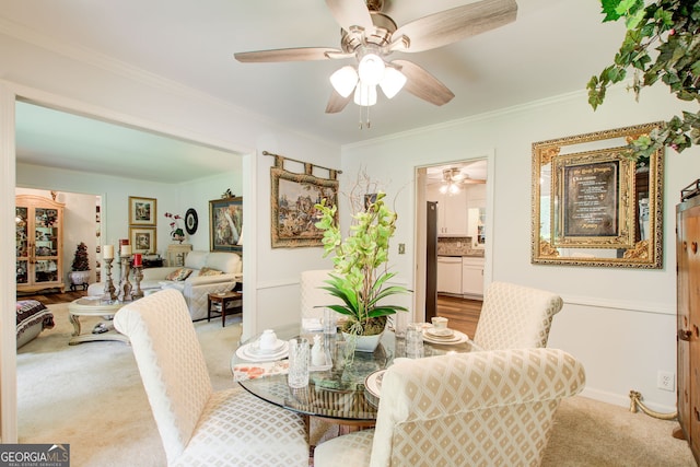 2440 Weatherford Ct, Marietta, GA 30068 - dining area featuring ceiling fan, light colored carpet, and ornamental molding
