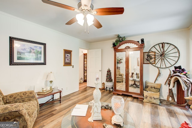 2440 Weatherford Ct, Marietta, GA 30068 - living room with ceiling fan, wood finished floors, and crown molding