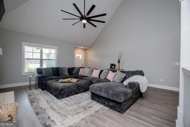 328 Brookstone Dr, Carrollton, GA 30116 - living room with high vaulted ceiling, ceiling fan, and wood finished floors