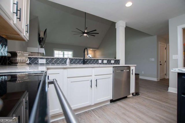 328 Brookstone Dr, Carrollton, GA 30116 - kitchen featuring dishwasher, backsplash, white cabinetry, light wood-style floors, and vaulted ceiling