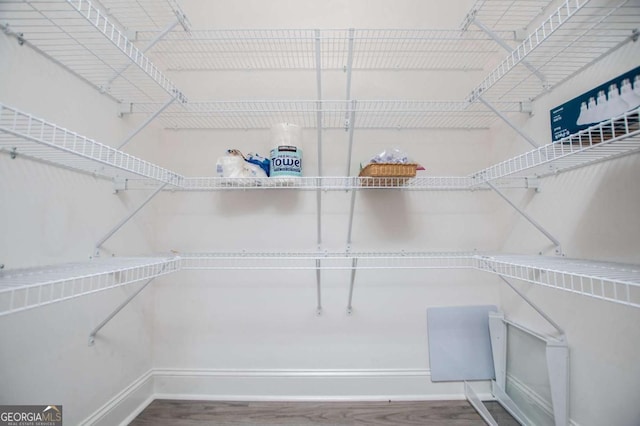 328 Brookstone Dr, Carrollton, GA 30116 - spacious closet featuring wood finished floors