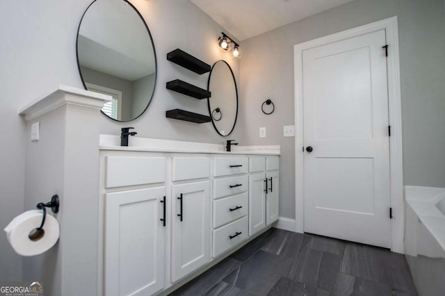 328 Brookstone Dr, Carrollton, GA 30116 - full bath with double vanity and a tub to relax in