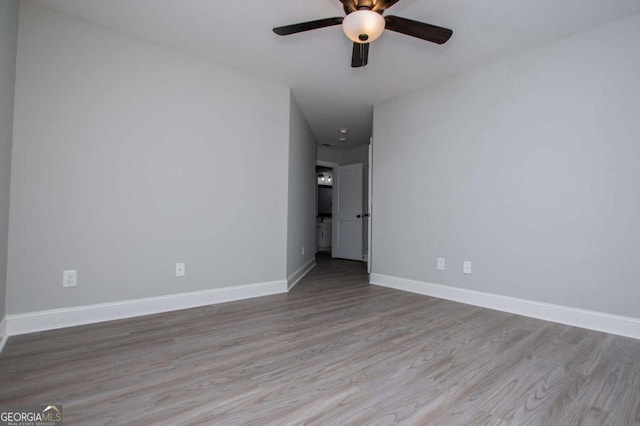 328 Brookstone Dr, Carrollton, GA 30116 - spare room with a ceiling fan and wood finished floors