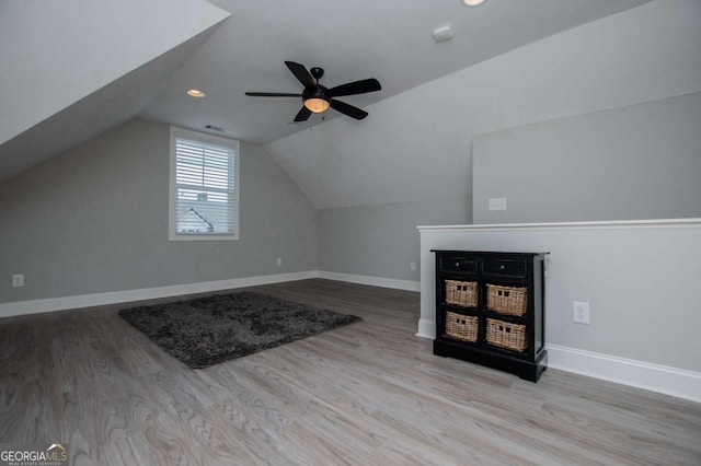 328 Brookstone Dr, Carrollton, GA 30116 - bonus room featuring wood finished floors, lofted ceiling, recessed lighting, and ceiling fan