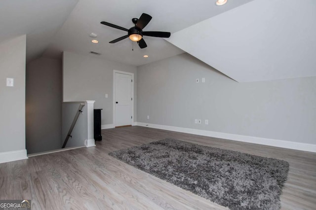 328 Brookstone Dr, Carrollton, GA 30116 - bonus room with vaulted ceiling, wood finished floors, recessed lighting, and a ceiling fan