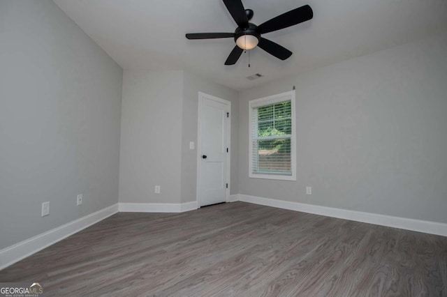 328 Brookstone Dr, Carrollton, GA 30116 - spare room featuring wood finished floors and ceiling fan