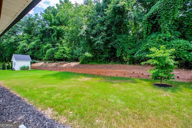 328 Brookstone Dr, Carrollton, GA 30116 - view of grassy yard with an outdoor structure