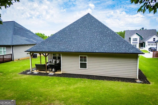 328 Brookstone Dr, Carrollton, GA 30116 - rear view of property with an outdoor living space, a shingled roof, a yard, and a patio