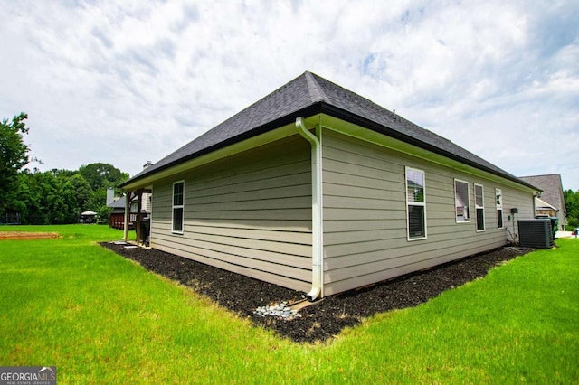 328 Brookstone Dr, Carrollton, GA 30116 - view of property exterior with a central air condition unit and a lawn