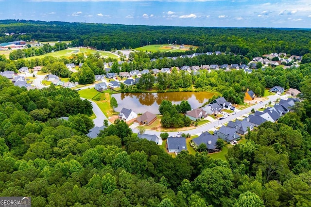 328 Brookstone Dr, Carrollton, GA 30116 - aerial perspective of suburban area with a forest and a large body of water